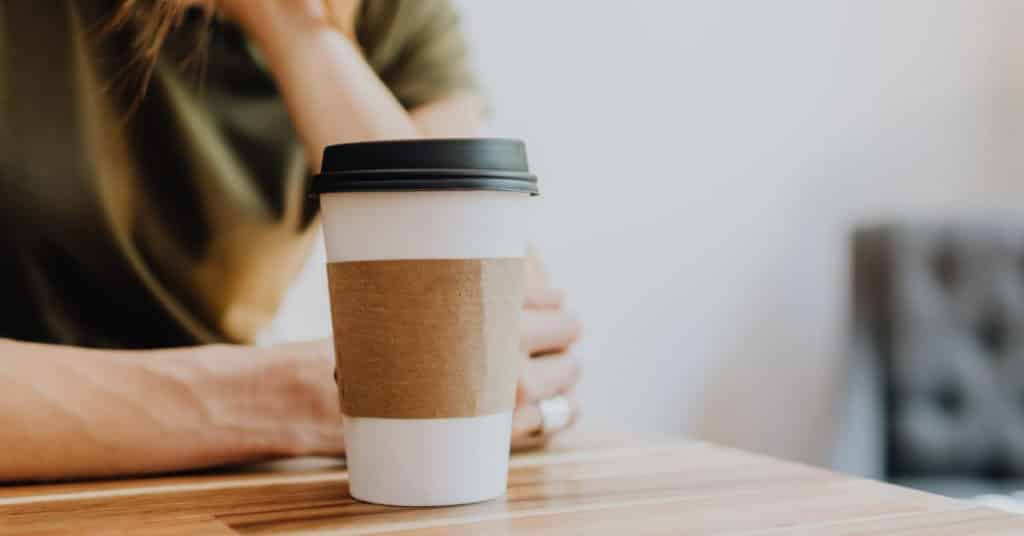 Ethical Brand Directory Blog | Top 10 Tips for Going Green | Woman with coffee cup