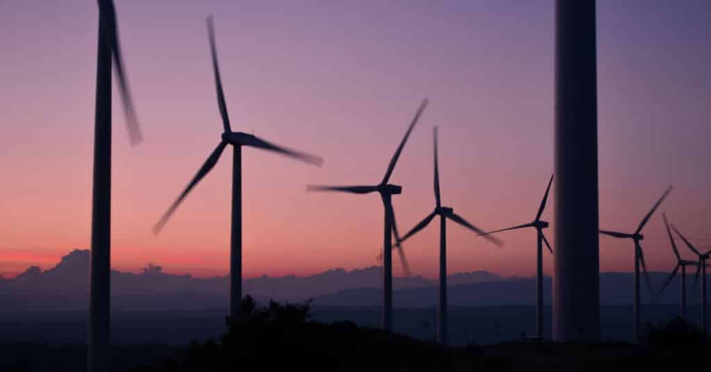 Ethical Brand Directory Blog | Top 10 Tips for Going Green | Wind Turbines in the sunset