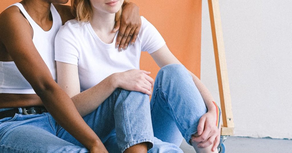 Ethical Brand Directory Blog | How is a white t-shirt made | Two models both wearing white t-shirts and jeans.