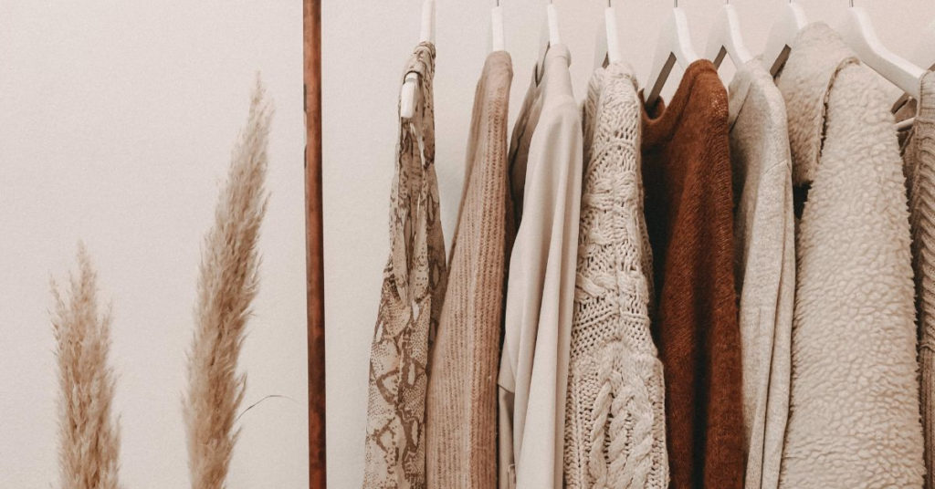 Ethical Brand Directory Blog | Building A Sustainable Summer Wardrobe | Clothing on a rack