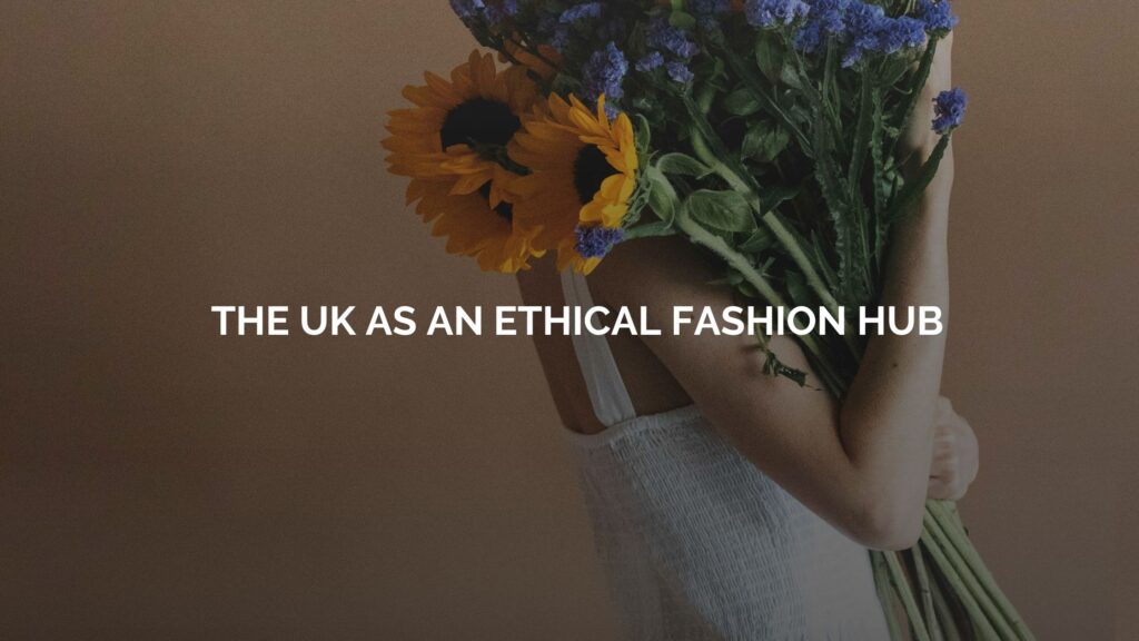 The UK as an Ethical fashion Hub | Woman holds a bunch of sunflowers 