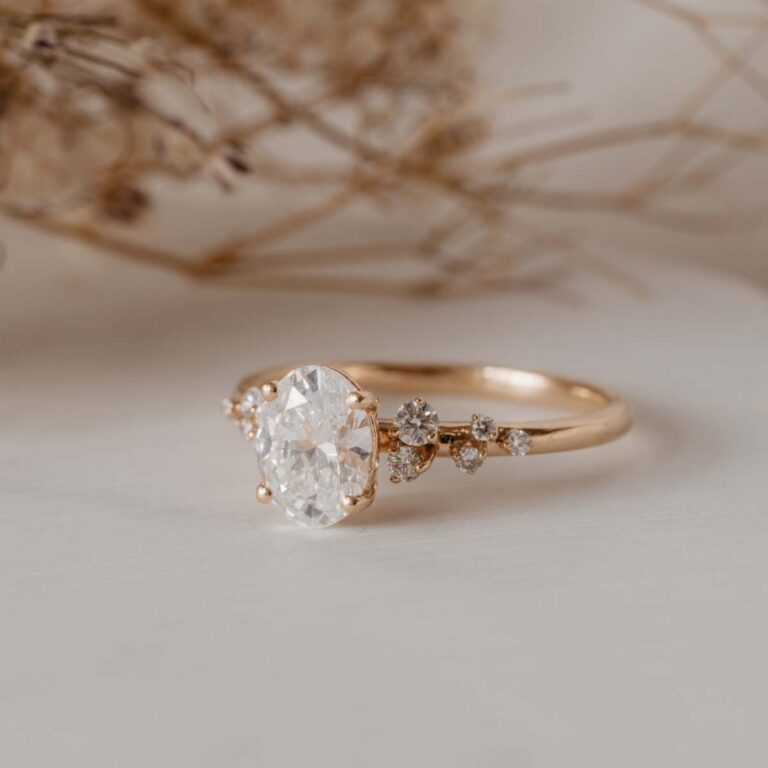 Ethical Logo | Lab-grown ethical diamonds | sustainable engagement rings and wedding bands | Classic gold band and oval set diamond