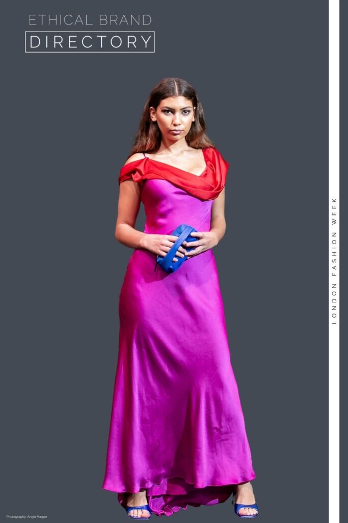 Ruby wearing a pink and red dress by Sanyukta Shrestha, carrying a blue clutch by Embellished Truth at LFW styled by Roberta Lee