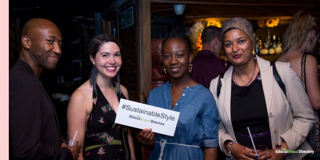 Guests at Mahiki holding a Sustainable Style sign